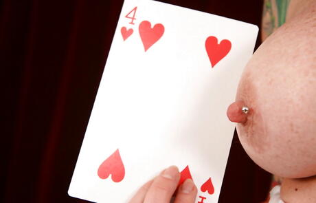 Deluxe american red-haired mature Kylie Ireland in sexy underwear exposing big boobs and puting a toy in her cunt 