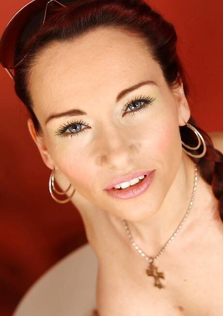 Excellent british milf Gabriela Red baring big knockers and jerking off 